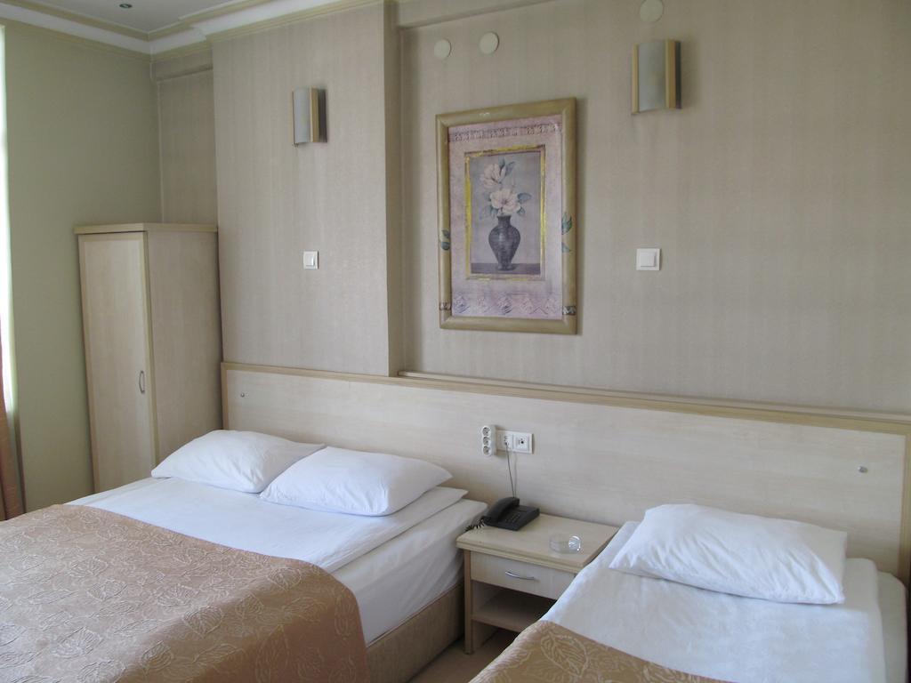 Kolagasi Hotel Corum Pokoj fotografie