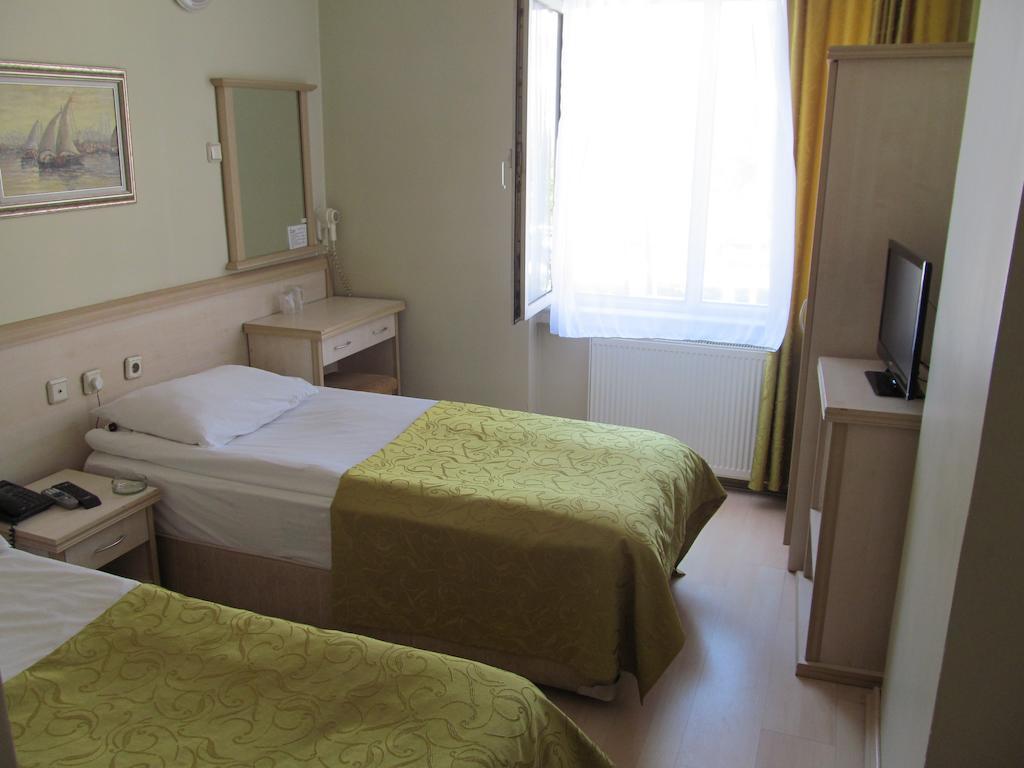 Kolagasi Hotel Corum Pokoj fotografie